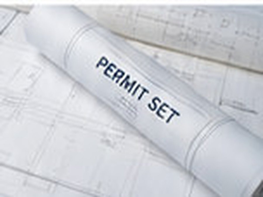 Rolled and flat construction drawings, the roll labelled Permit Set