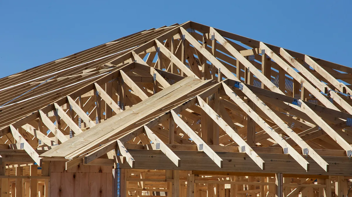Illustrative timber roof framing on a house under construction